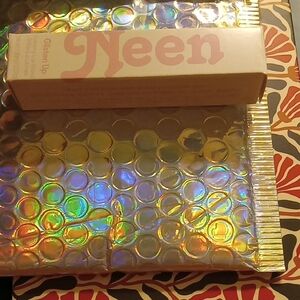 Neen Glisten Creamy Lip Gloss in shade - bye